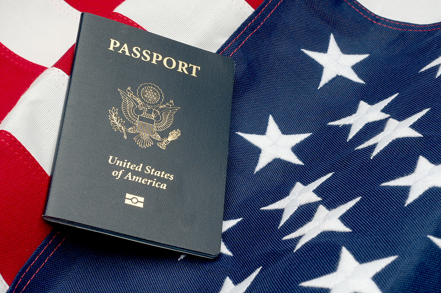 American passport on an American flag
